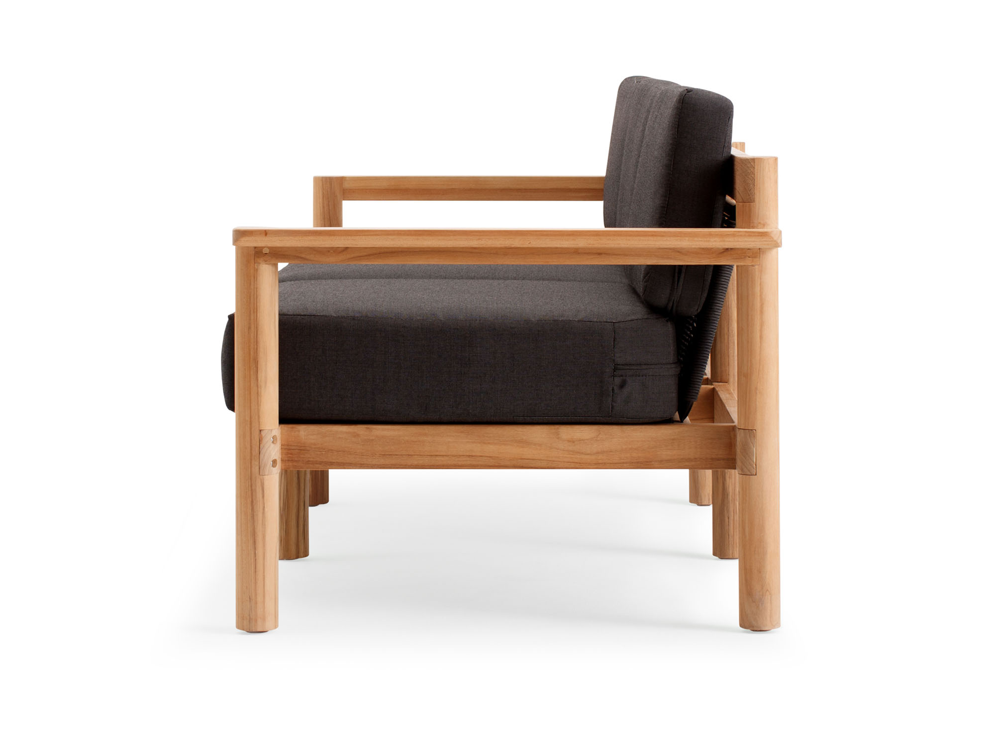 Side view of outdoor sofa with black cushions